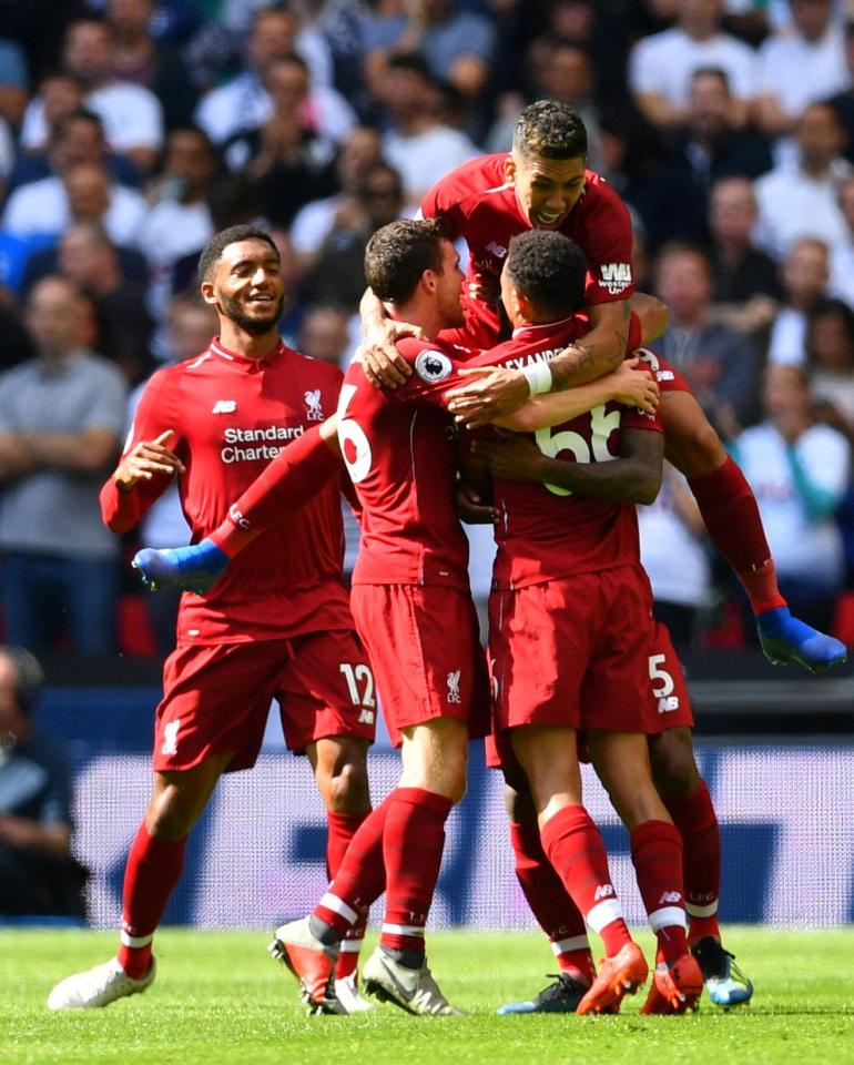  Liverpool players celebrate taking the lead at Wembley