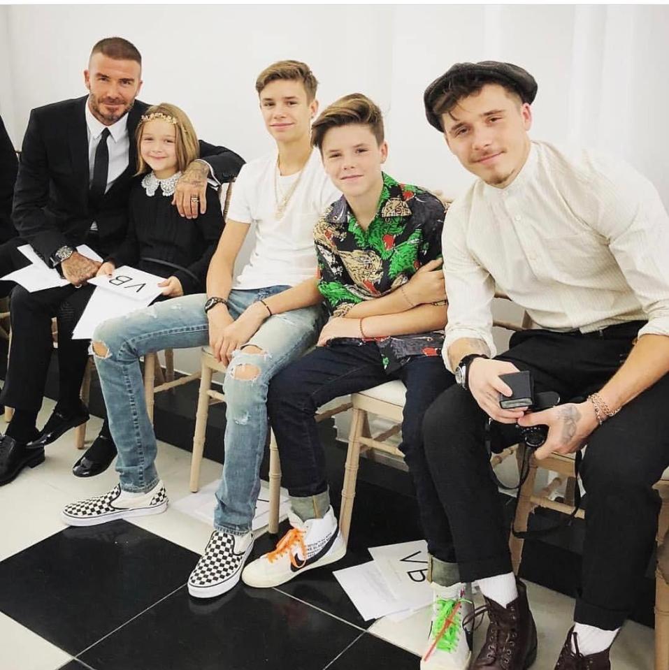  Brooklyn (right) had joined dad David, and siblings Harper, Romeo and Cruz (L-R) on the FROW at the catwalk event earlier today