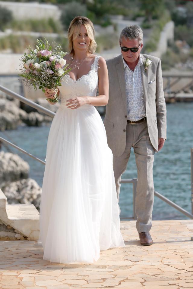  Rhian Sugden wows in a gorgeous white dress as she walks down the aisle