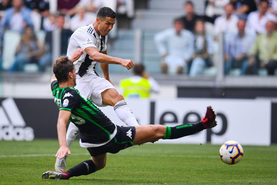  Cristiano Ronaldo drills a low shot to make it 2-0 to Juventus at the Allianz Stadium