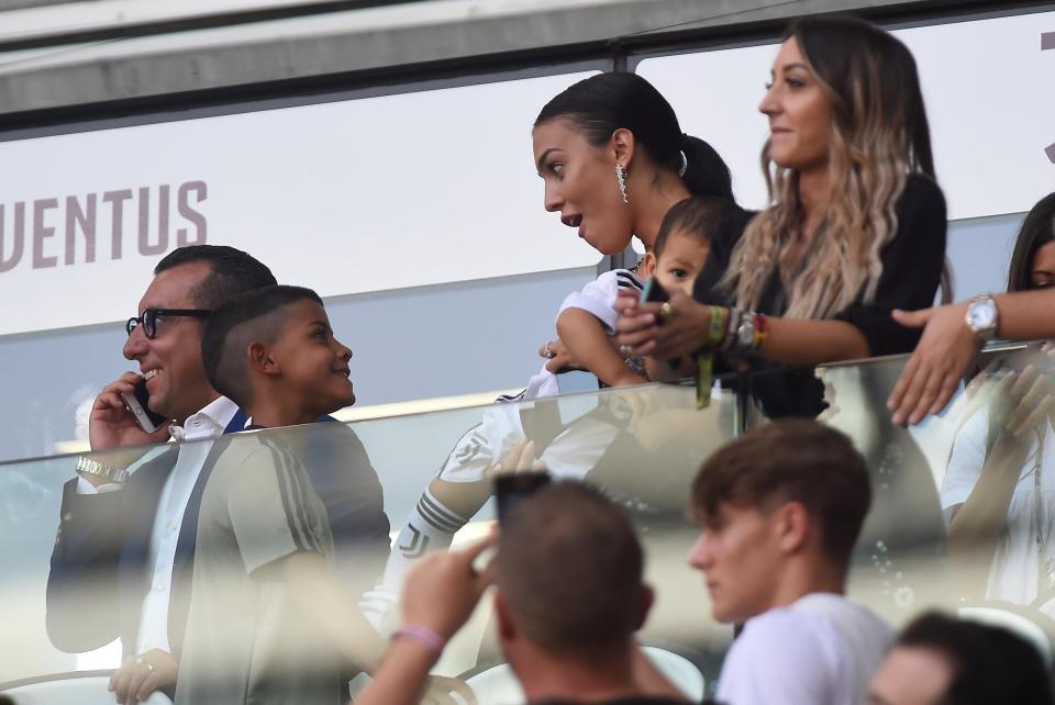  Cristiano Jr and Georgina Rodriguez were all smiles at the Allianz Stadium after watching Ronaldo Sr fire in the goals