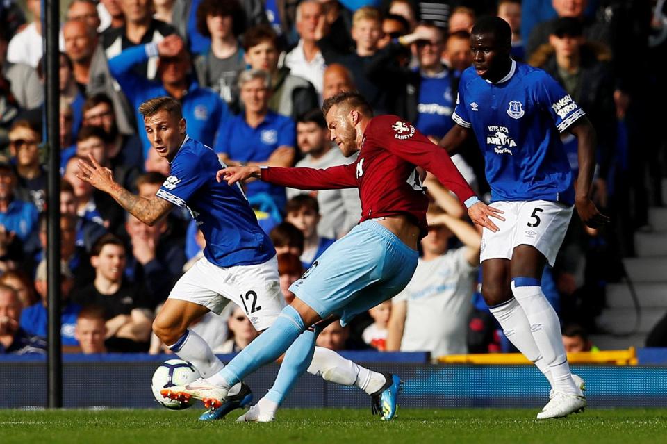  Andriy Yarmolenko curls home his brilliant second goal as West Ham beat Everton 3-1