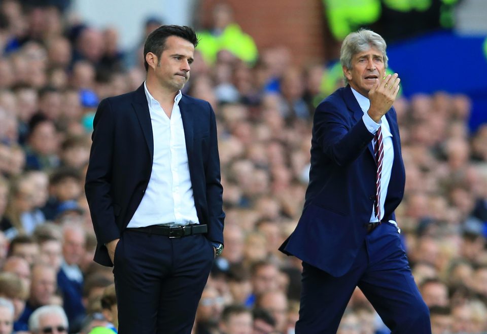  Manuel Pellegrini, right, got his first win as West Ham boss in five Prem games