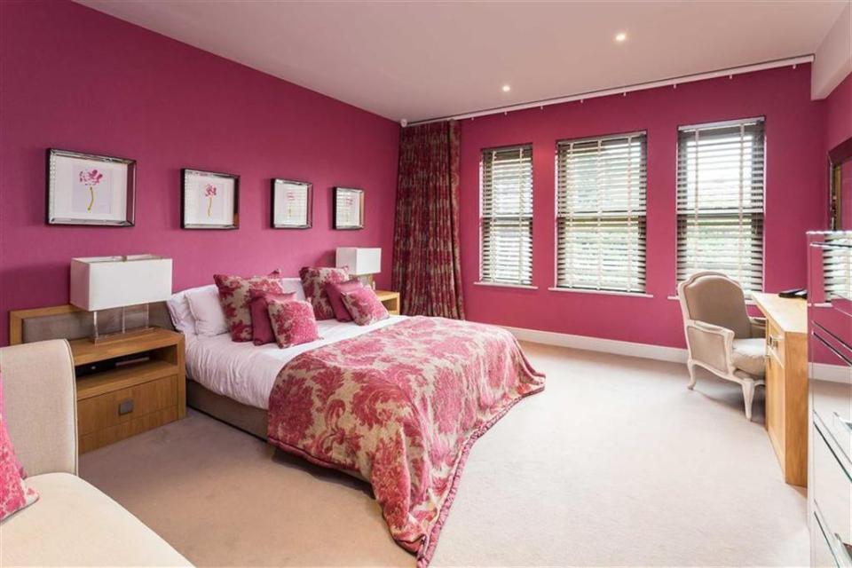  Most of the bedrooms are neutral in theme apart from this pink room