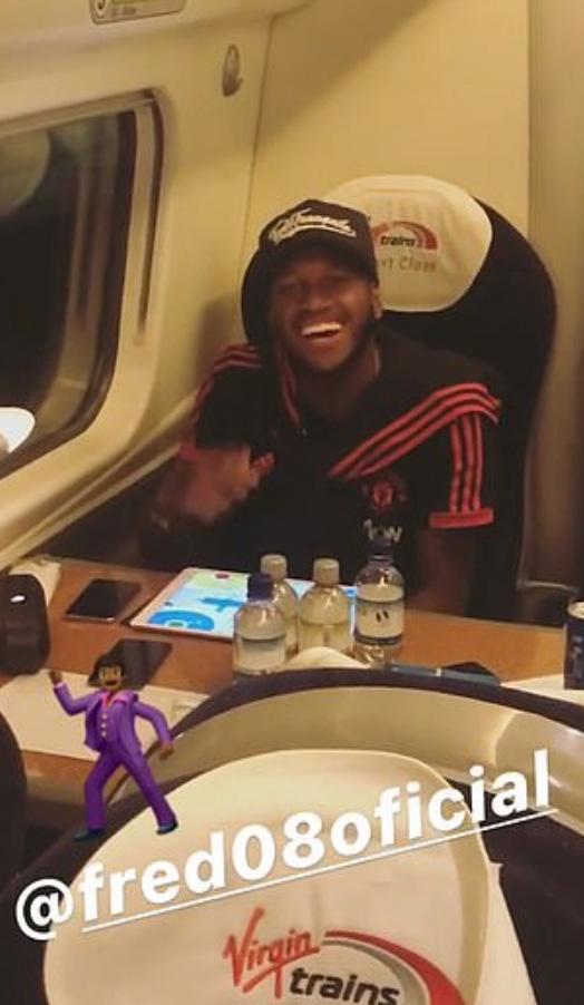  Pogba fimed grinning Fred on the train as the players headed north