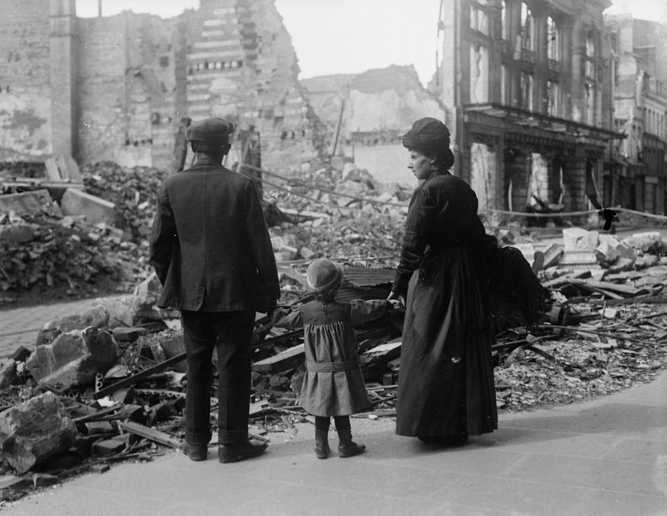  A refugee family returning to find their home in Amiens, France, in ruins