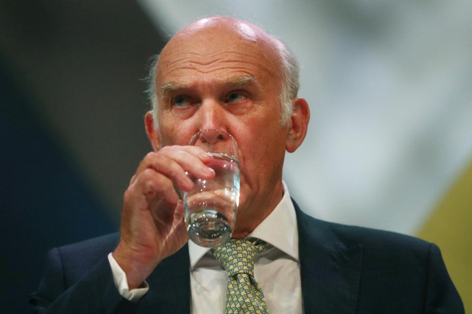  The Lib Dem leader taking a sip of water during the speech