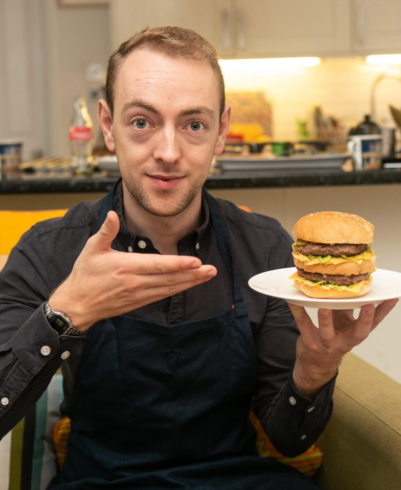  Sun man Nick becomes bun man, as he proudly shows off his own version of a Big Mac