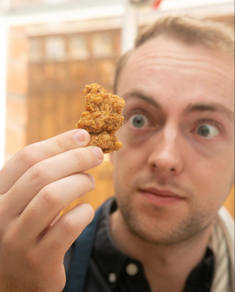  The look on Nick's face says this chicken looks finger-lickin' good