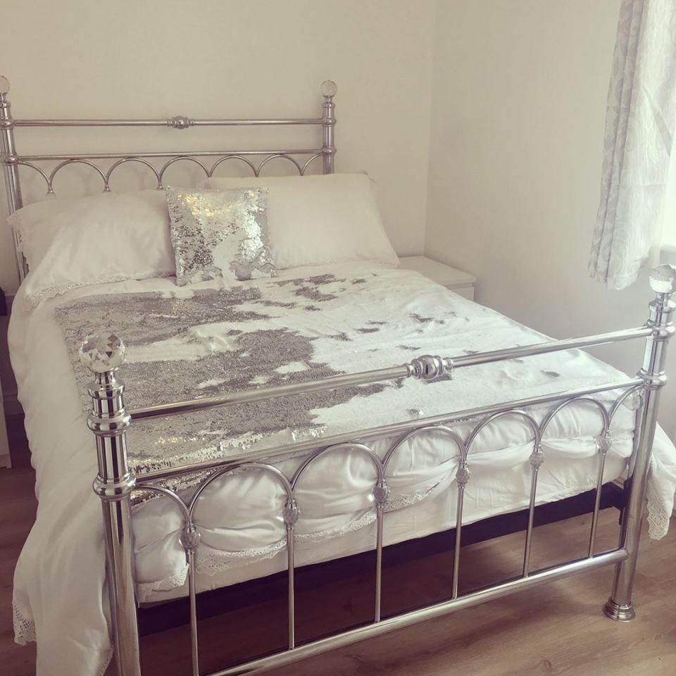  Cara and Nathan's bed has an eye-catching silver frame