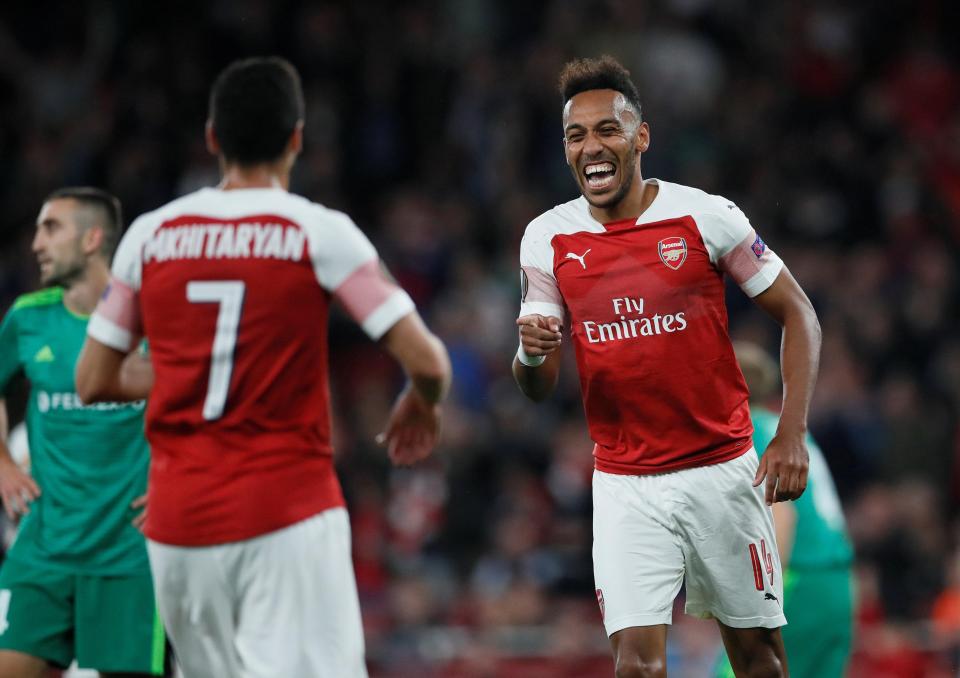  Gabon international Aubameyang reacts with team-mate Henrikh Mkhitaryan after making it 3-0