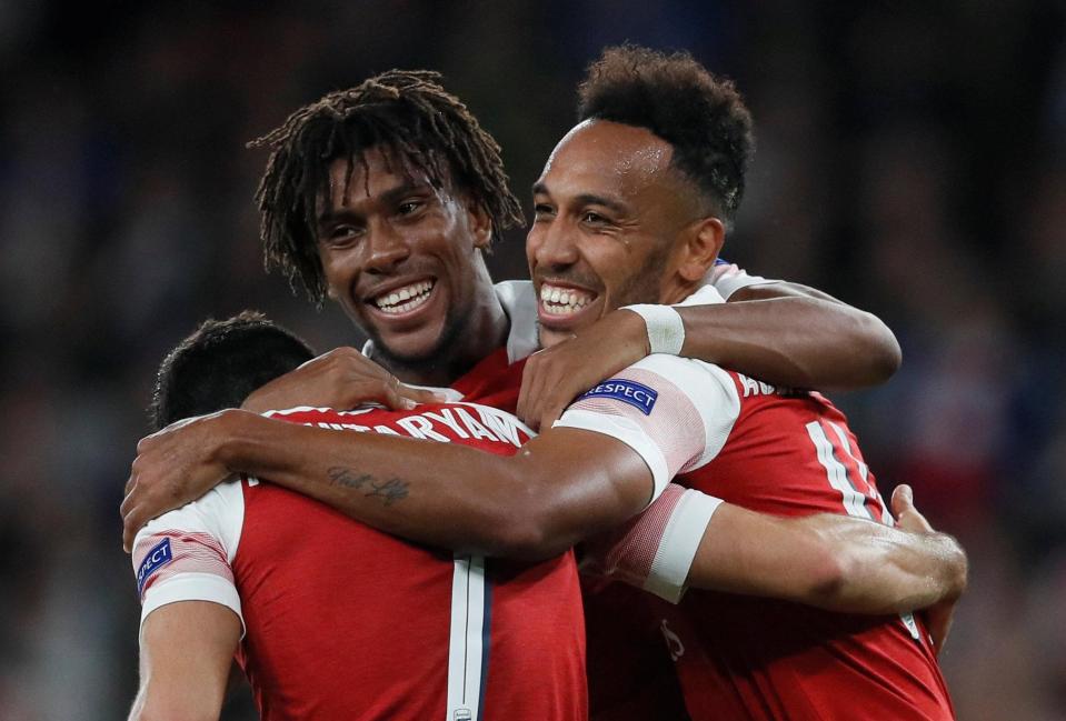  Alex Iwobi, middle, is enjoying life under Unai Emery