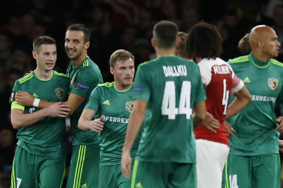  Volodymyr Chesnakov (left) pulled a late goal back as Bernd Leno failed to keep a clean sheet