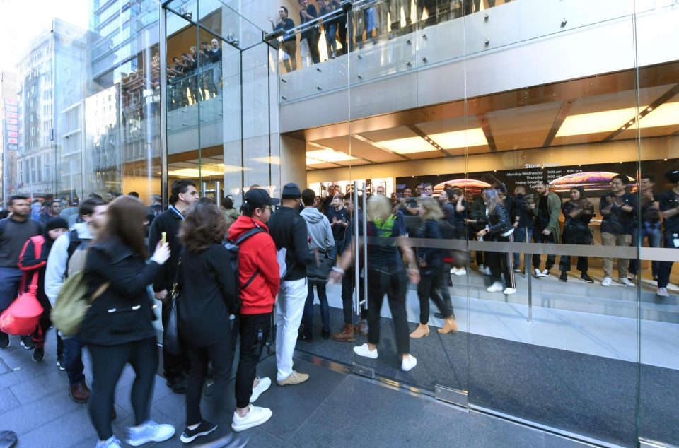  Crowds wait outside the Sydney store after the overnight release of Apple's latest products