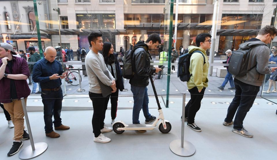  People wait patiently outside one store in the hopes of being the first to bag the XS product