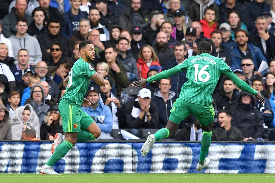  The Watford star celebrates giving his side the lead at Craven Cottage