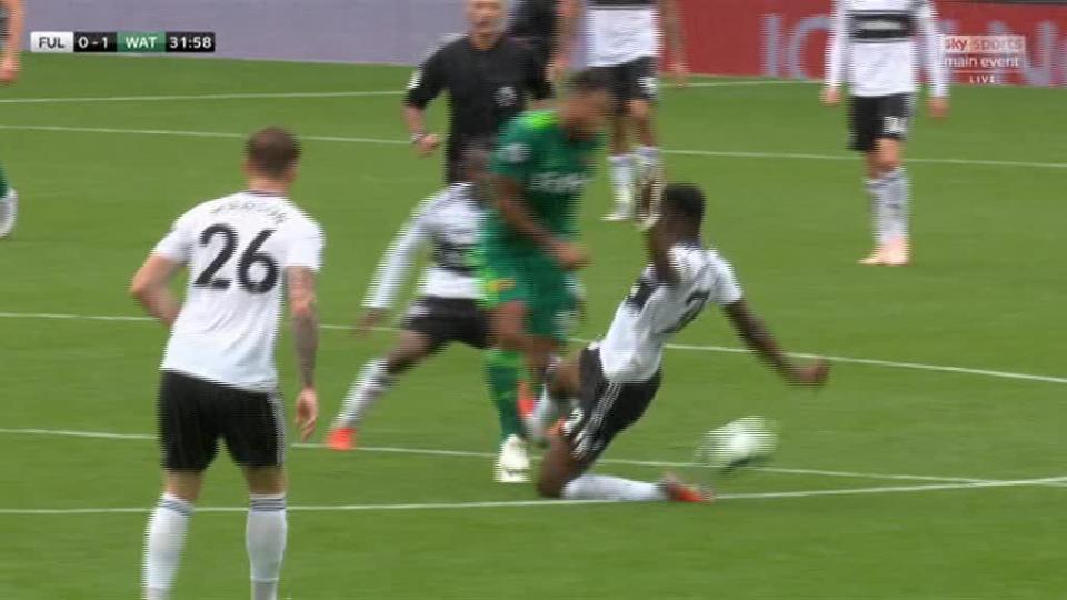  The Watford man clatters into Fosu-Mensah during the first-half flashpoint