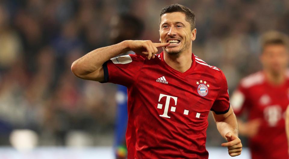  Robert Lewandowski celebrates his penalty in Bayern's win over Schalke