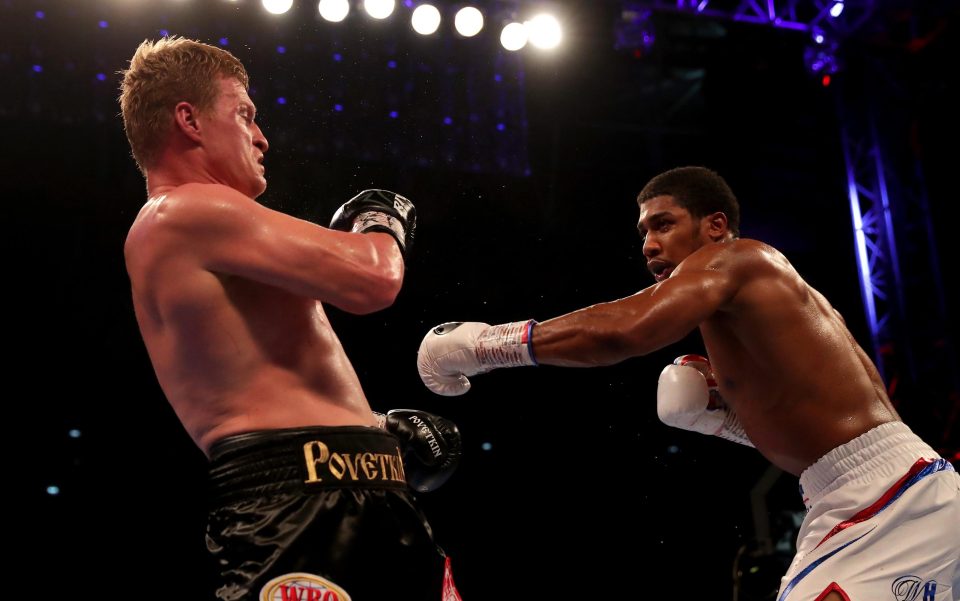  Povetkin, left, started well but Joshua's power was too much for the Russian