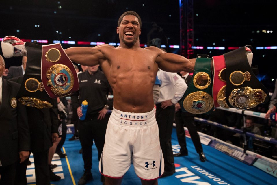  Anthony Joshua celebrates with his world heavyweight titles