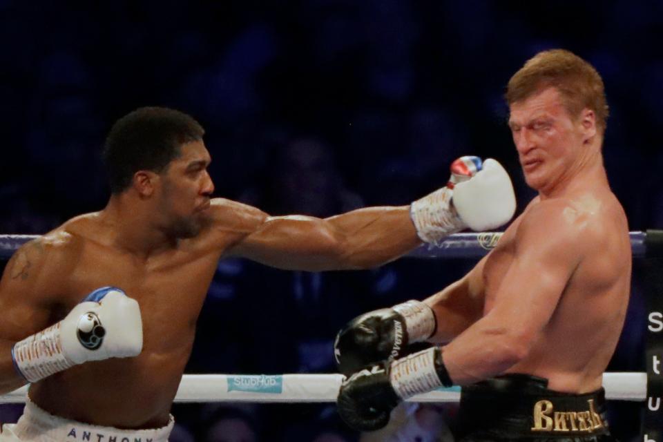  Joshua survived an early scare in the opening round to blast Povetkin away