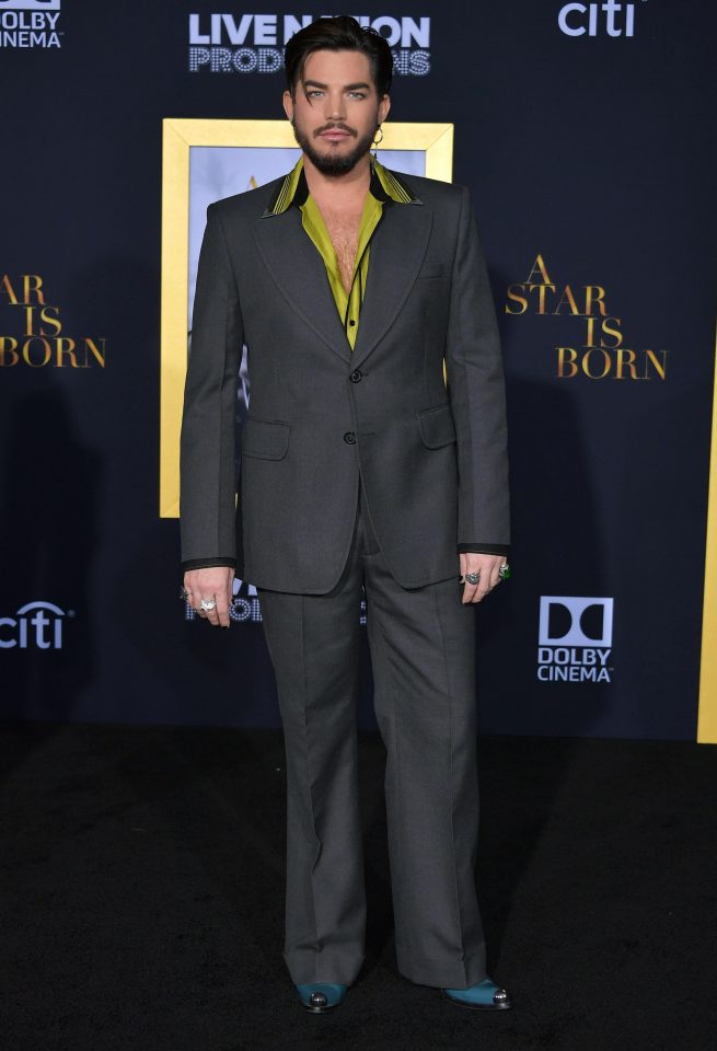 Adam Lambert also posed for cameras in a 70s style suit, complete with lime green shirt and teal shoes