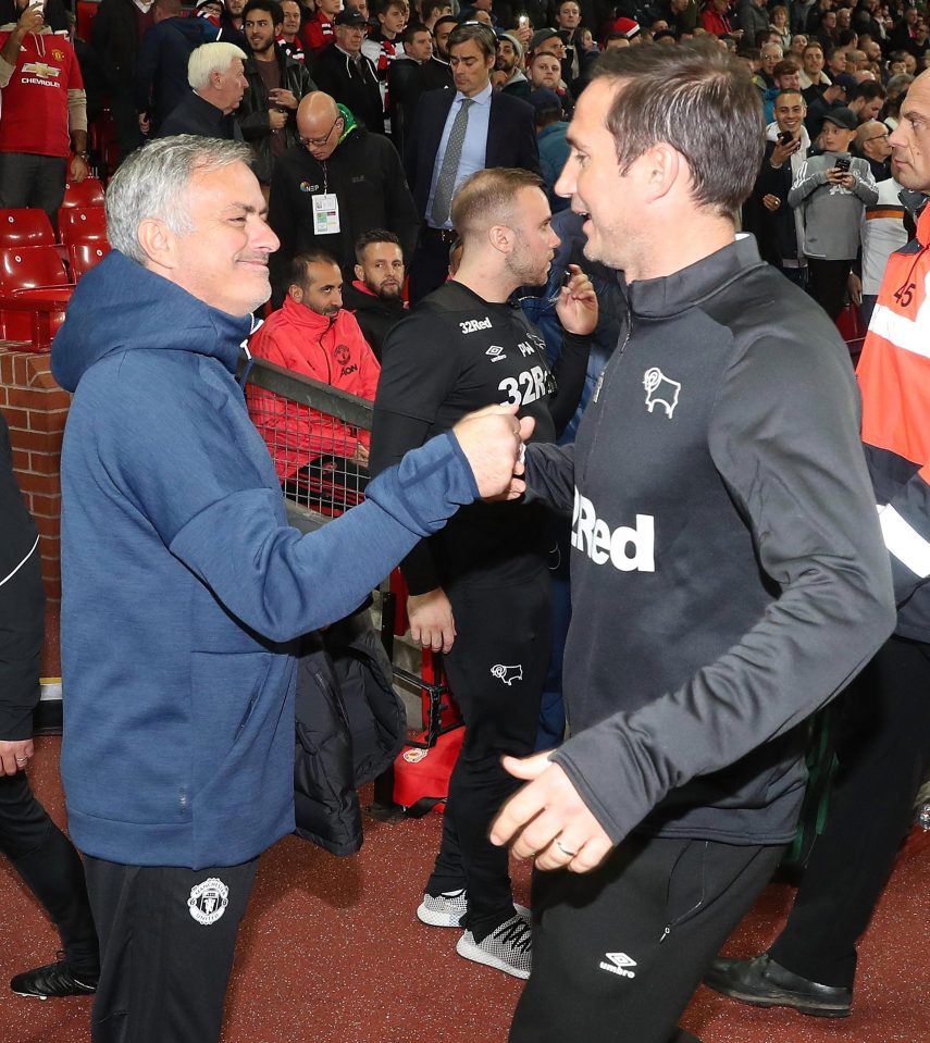  Frank Lampard is welcomed to Old Trafford by Jose Mourinho