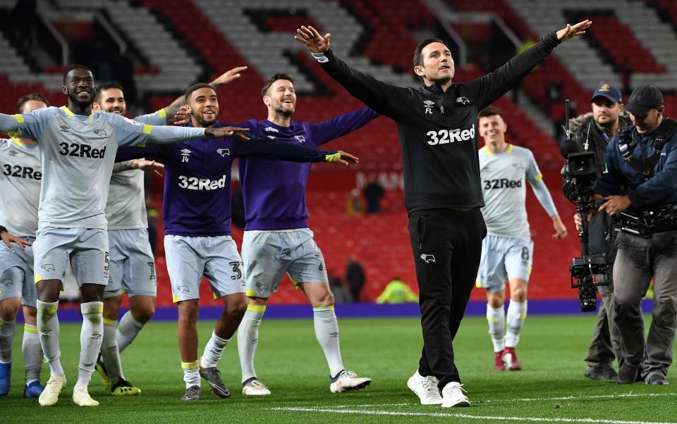  Frank Lampard leads his triumphant team in celebrating in front of the visiting supporters