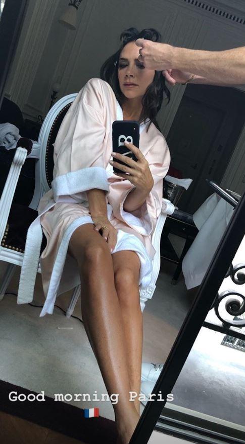  Victoria Beckham gave fans a glimpse of what goes on behind the scenes as she shared a pic of her prepping for Paris Fashion Week