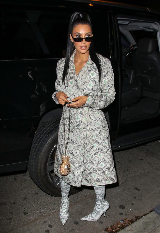  Kim Kardashian wore a trenchcoat covered in dollar bills