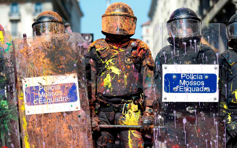  Pro-independence supporters threw coloured paint over the police