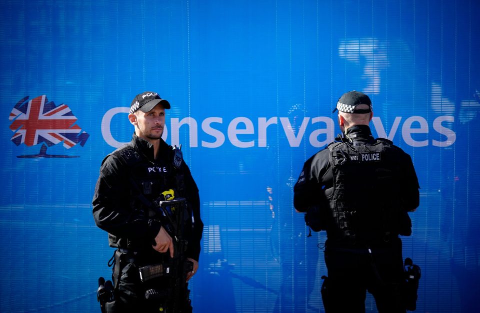  Armed police patrol keep watch as politicians and delegates begin to arrive for the annual event at the International Convention Centre