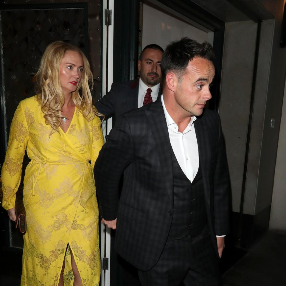  The telly star, 42, wore a three-piece suit and white shirt to the swanky venue, while Anne-Marie couldn't be missed in a bright yellow dress