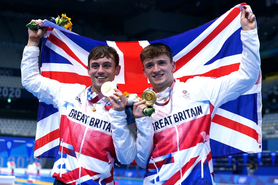 Tom Daley and Matty Lee celebrate winning gold at the Tokyo 2020 Olympic Games in Japan