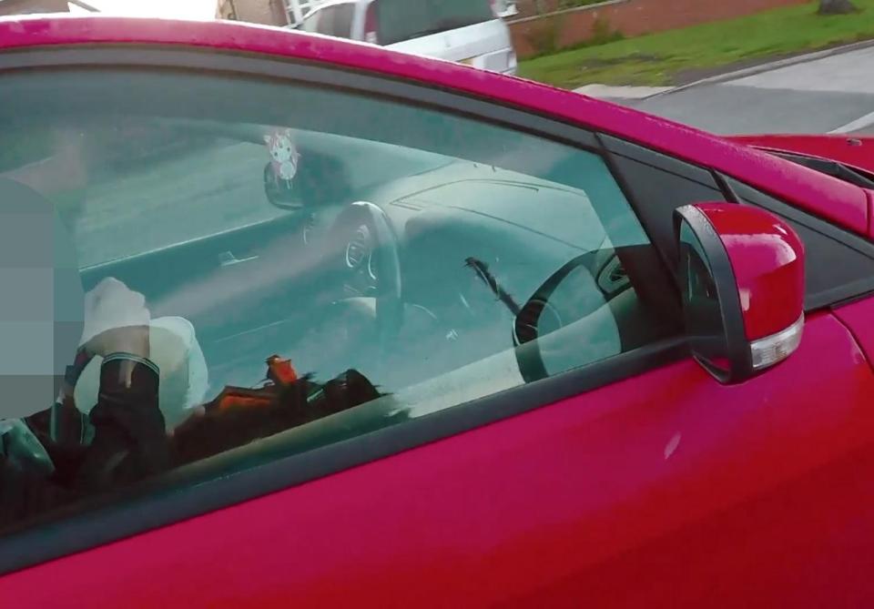  This driver was spotted brazenly eating a bowl of cereal at the wheel on a busy road near Manchester