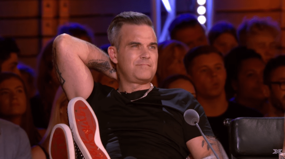  Robbie Williams has become embroiled in a transphobia row following comments on The X Factor