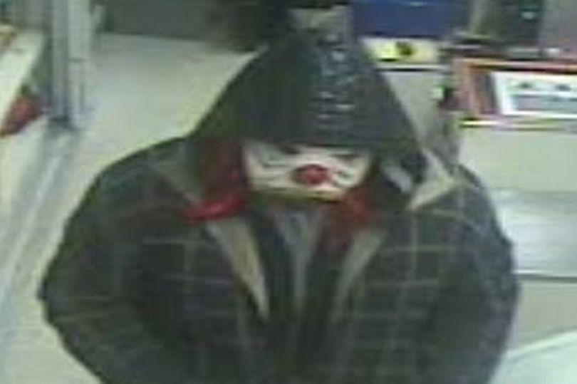 A 'Killer Clown' thug is seen in Prestwich, Greater Manchester, last month during a raid on a Sainsbury's