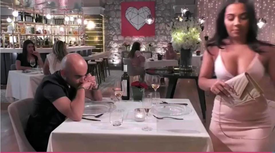  The awkward scene was slammed by viewers, who said 'there's no coming back from that', as she walked away from the table