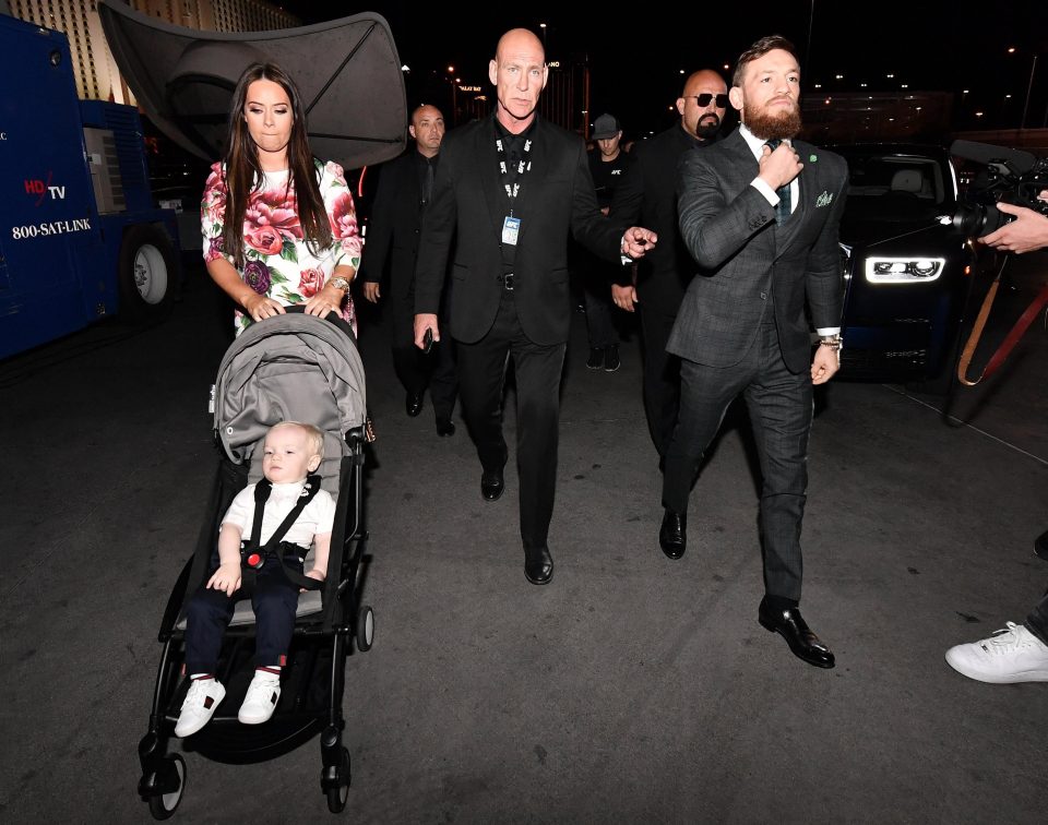  McGregor arrives with Dee and their 18-month-old son Conor Jr at the T-Mobile Arena