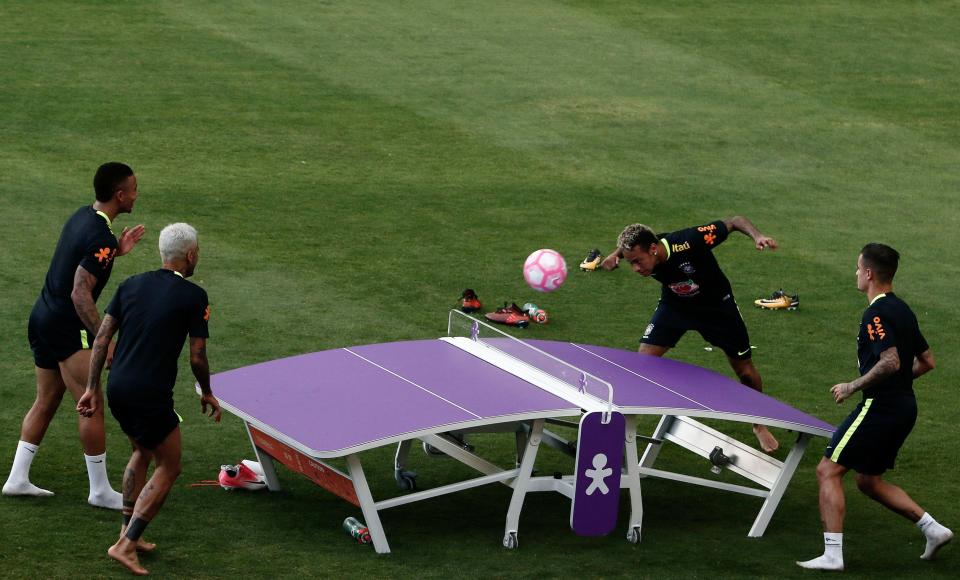  Gabriel Jesus, Dani Alves, Neymar and Philippe Coutinho have a game of Teqball during a Brazil training session at the World Cup