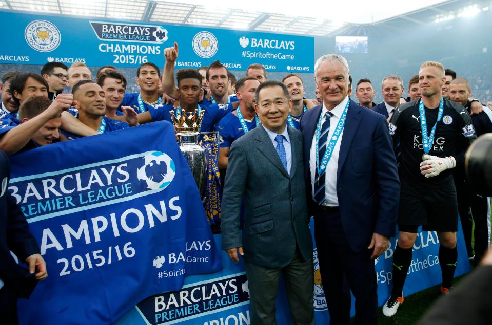  Vichai Srivaddhanaprabha and Claudio Ranieri celebrate with the Leicester squad after winning the Premier League title