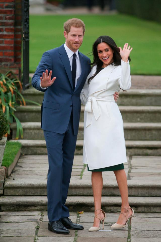  Prince Harry and Meghan Markle pose in the Sunken Garden after announcing their engagement