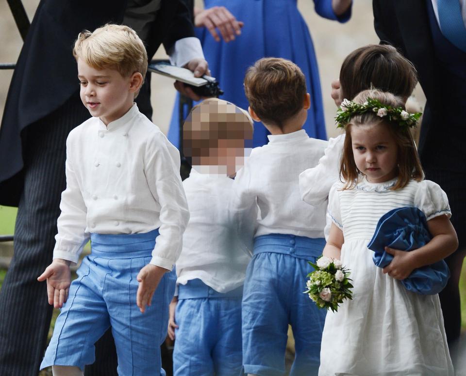  Prince George practices his marching at a posh wedding earlier this year