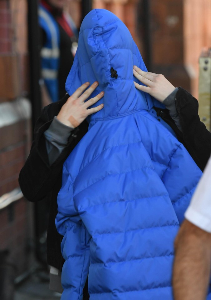 He went so far as to put a blue jacket over his face