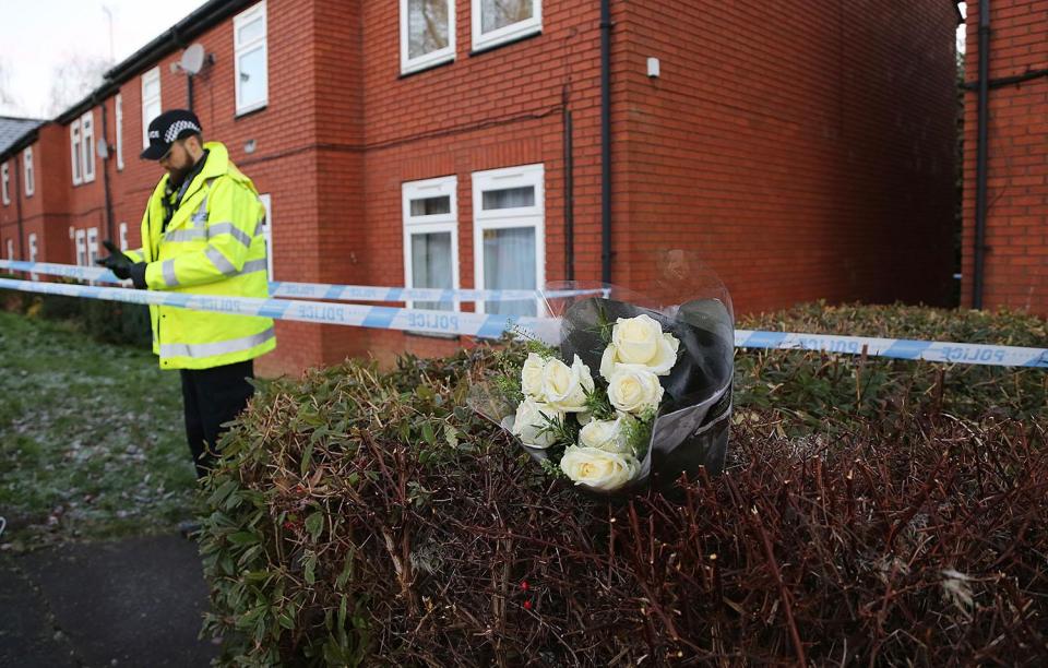  Flowers were left outside father Raphael Kennedy's house where cops found drug paraphernalia along with hundreds of pounds worth of crack and heroin