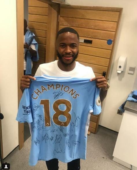  Sterling presented Edwards with a signed Man City jersey after the team won the Premier League