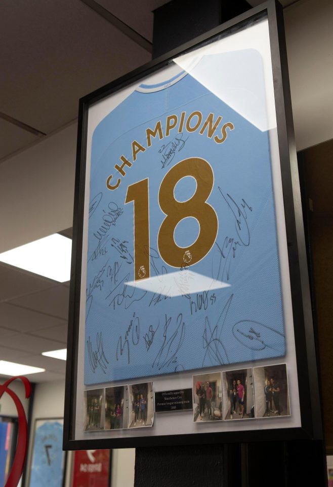  The signed jersey hangs in the shop in Battersea