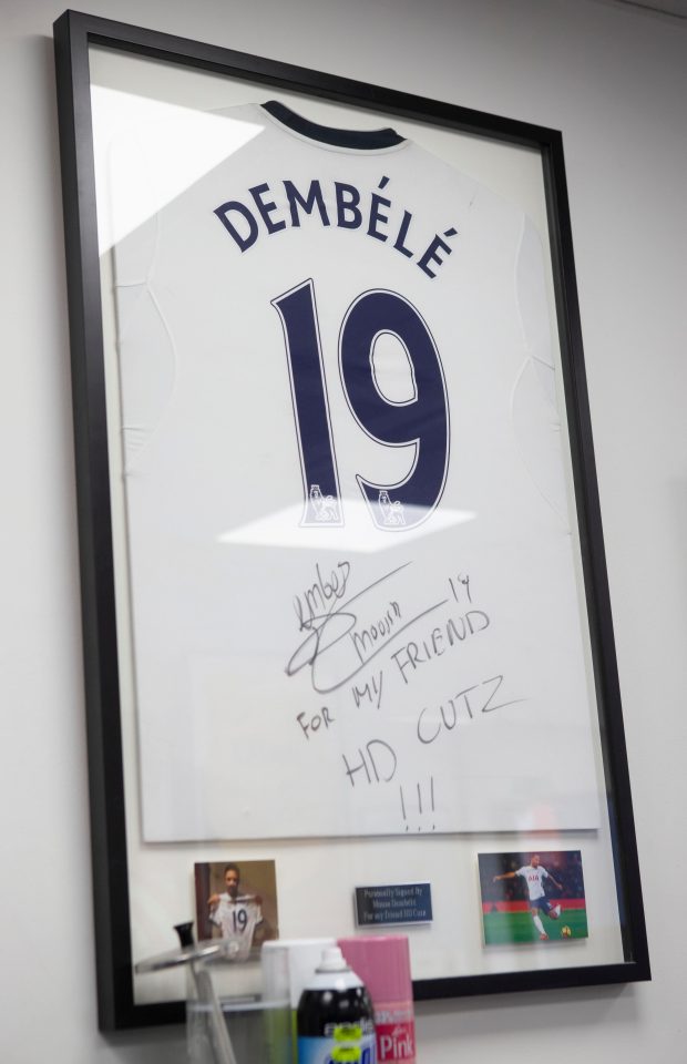  Dembele's shirt hangs in Edward's shop carrying a message from the midfielder