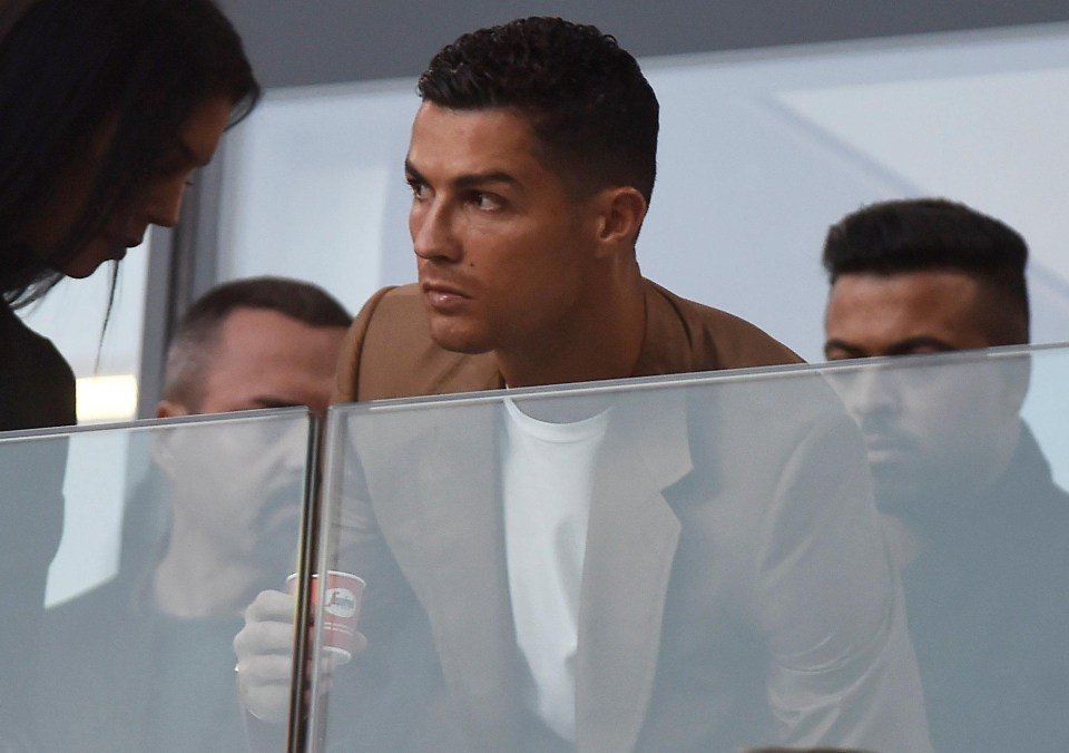 Cristiano, 33, keeps a watchful eye on the game. He is serving a match ban after being red-carded last week