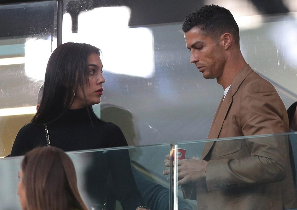  Cristiano Ronaldo and Georgina Rodriguez are seen during the Group H match of the UEFA Champions League